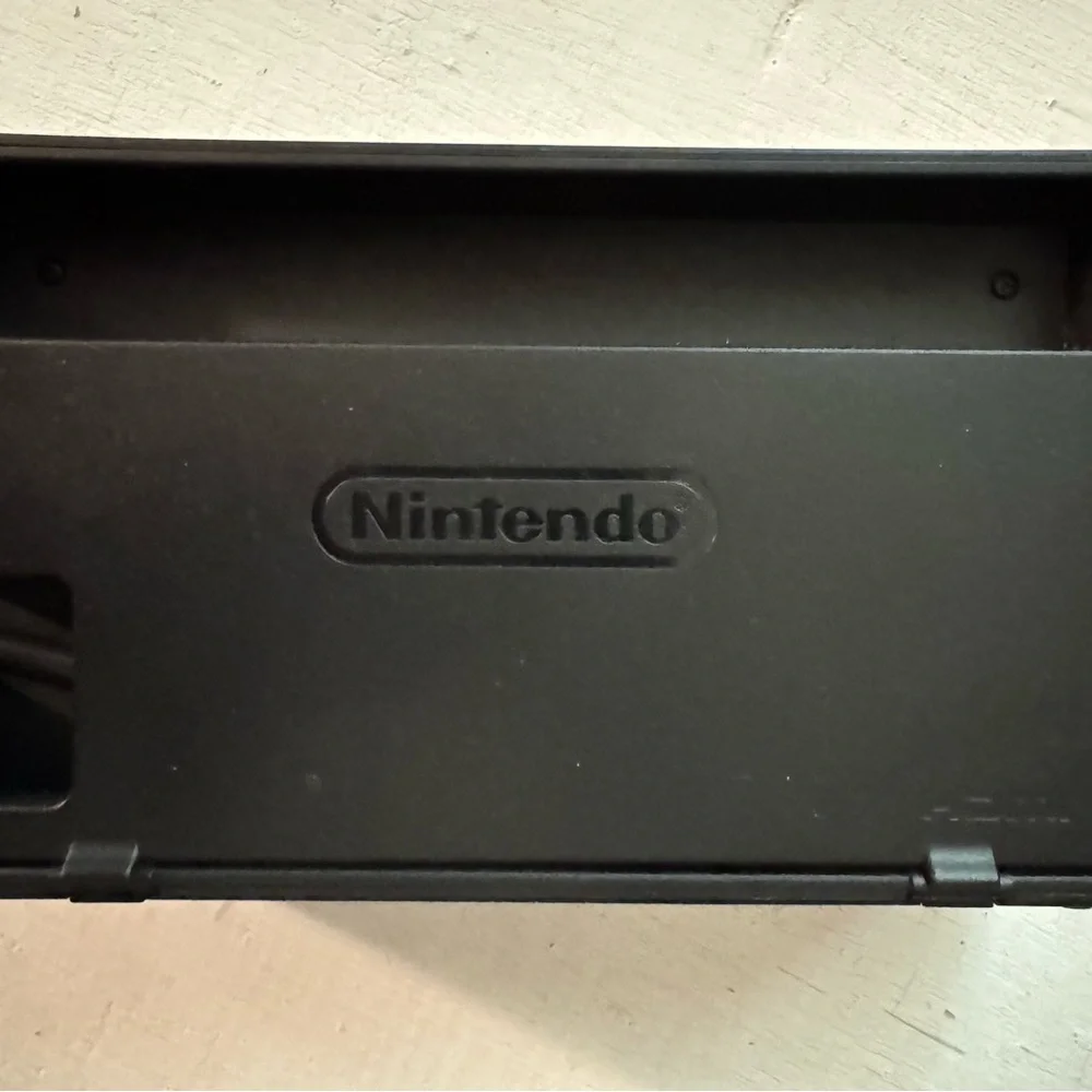 Nintendo Switch with Purple and Orange Joy-Con
